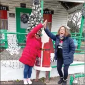  ?? SUBMITTED PHOTO ?? Rosalie Hetrick, left, and her sister Maria Jacobs celebrate the completed “Polar Express” cabin.