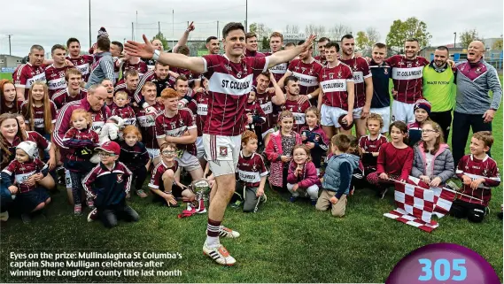  ??  ?? Eyes on the prize: Mullinalag­hta St Columba’s captain Shane Mulligan celebrates after winning the Longford county title last month