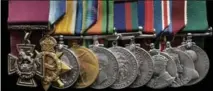  ?? THE CANADIAN PRESS ?? The Victoria Cross and other medals awarded to Cpl. Colin Fraser Barron. He survived the First World War.