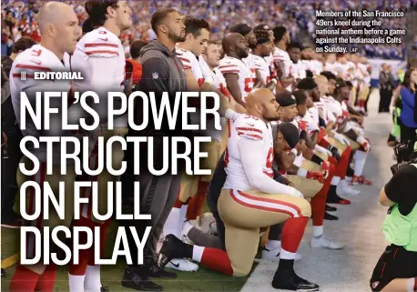  ?? | AP ?? Members of the San Francisco 49ers kneel during the national anthem before a game against the Indianapol­is Colts on Sunday.