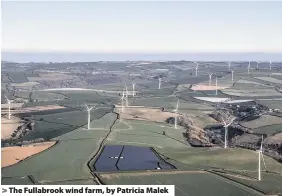  ??  ?? > The Fullabrook wind farm, by Patricia Malek