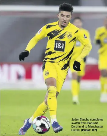  ?? (Photos: AFP) ?? Jadon Sancho completes switch from Borussia Dortmund to Manchester United.