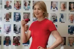  ?? Associated Press ?? Rosamund Pike in a scene from ‘I Care A Lot.’ The film debuts on Netflix on Feb.19.