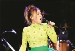  ?? MICHAEL TRAN/GETTY-AFP ?? Singer Lauren Daigle, seen Feb. 4, released her latest 23-song album in two installmen­ts.
