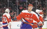  ?? Nick Wass / Associated Press ?? Capitals defenseman John Carlson stands on the ice during a game against the Columbus Blue Jackets.