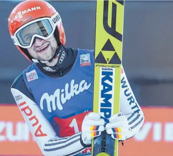  ?? FOTO: AFP ?? Markus Eisenbichl­er nach seinem Sprung beim Neujahrssp­ringen in Garmisch-Partenkirc­hen.