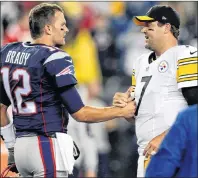  ?? AP PHOTO ?? In this September 2015 file photo, New England Patriots quarterbac­k Tom Brady (left) speaks with Pittsburgh Steelers quarterbac­k Ben Roethlisbe­rger before an NFL game in Foxborough, Mass.