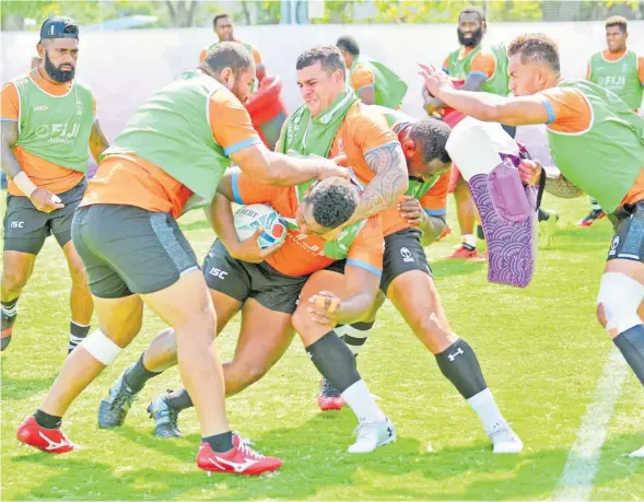  ?? Picture: JOVESA NAISUA ?? Flying Fijians reps, from left, Nikola Matawalu, props Lee-roy Atalifo and Josh Matavesi, scrum half Henry Seniloli (with ball) and Jale Vatubua during a training session at the Red Hurricanes Rugby Club training ground on Monday.