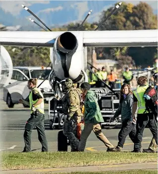  ?? BRADEN FASTIER/STUFF ?? Dion Reynolds and Jessica O’Connor at Nelson Airport yesterday.