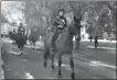  ?? PROVIDED TO CHINA DAILY ?? Equestrian­s take a ride on a path dedicated to horses in Beijing on Wednesday.