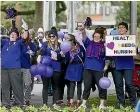  ??  ?? Nurses rally in Palmerston North for better pay and conditions.