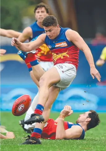  ?? Pictures: AFL PHOTOS ?? Brisbane’s Dayne Zorko clears the ball during the tight win over North Melbourne.