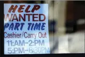  ?? NAM Y. HUH — THE ASSOCIATED PRESS FILE ?? A help-wanted sign is displayed at a restaurant in Arlington Heights, Ill., on Jan. 30.
