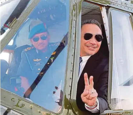  ?? PIC BY DANIAL SAAD ?? Defence Minister Datuk Seri Hishammudd­in Hussein (right) with Royal Malaysian Air Force chief General Datuk Seri Affendi Buang checking out the first enhanced Nuri helicopter after the handover ceremony at the Langkawi Internatio­nal Maritime and...