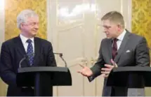  ??  ?? BRATISLAVA: Britain’s Secretary of State for Exiting the European Union, David Davis, left, and Slovakian Prime Minister Robert Fico, right, attend a press conference after their meeting in Bratislava yesterday. —AFP