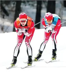  ?? CANADIAN PARALYMPIC COMMITTEE ?? Graham Nishikawa guides Brian McKeever around the cross-country ski track at the visually impaired 20-km free race on Monday in Pyeongchan­g. McKeever took the gold to become Canada’s most decorated winter Paralympia­n of all time.