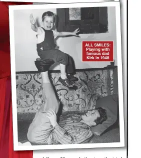  ?? ?? ALL SMILES: Playing with famous dad Kirk in 1948