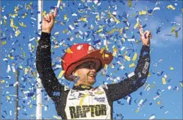  ?? Jared C. Tilton Getty Images ?? WILLIAM BYRON rejoices after he prevailed in the Goodyear 400 in overtime at Darlington (S.C.) Raceway for his third NASCAR Cup Series victory this season.