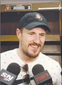  ?? CP PHoTo ?? Ottawa Senators defenceman Dion Phaneuf talks with reporters in the Senators’ dressing room in Ottawa.