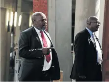  ?? /A L A I S T E R RUSSELL ?? Former NPA head Mxolisi Nxasana enters the Constituti­onal Court in the Johannesbu­rg, where the court ruled yesterday that the appointmen­t of his successor Shaun Abrahams was unlawful.