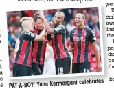  ??  ?? celebrates PAT-A-BOY: Yann Kermorgant