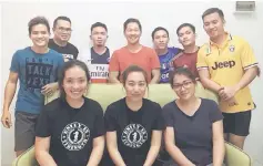  ??  ?? Petrus (standing, centre) with other committee members of the Miri PLBS inaugural football competitio­n.