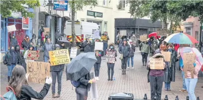  ?? Pictures: Gary Jones Photograph­y ?? People gather at a Black Lives Matter protest in Carmarthen on Saturday morning.