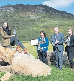  ?? Picture: PPA. ?? Helen Stewart was presented with her certificat­e and £500 by Margaret Hebbourn and Brian Lochhead of NFU Mutual and Kathryn Mutch of Scotland Food &amp; Drink.