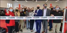  ?? PHOTO PROVIDED ?? Celebratin­g the ribbon cutting for Noble Gas Solutions.