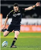  ?? PHOTO: GETTY IMAGES ?? Highlander­s first fiveeighth Marty Banks takes a shot at goal during his team’s match against the Hurricanes at Forsyth Barr Stadium in Dunedin last month.