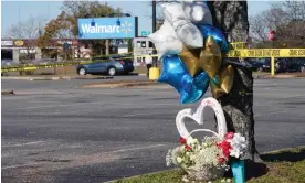  ?? ?? A memorial is seen in the parking lot after a mass shooting at a Walmart in Chesapeake, Virginia, on Wednesday. Photograph: Jay Paul/Reuters