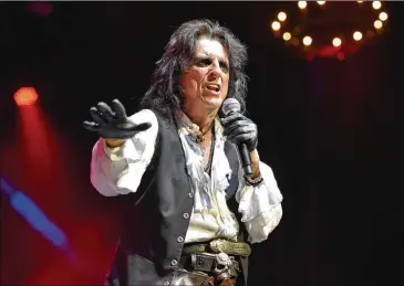  ?? PHOTOS BY ROB GRABOWSKI/INVISION/AP 2019 ?? Alice Cooper performs in Chicago in July 2019. The rock icon spent his downtime during the COVID-19 pandemic with his family in Phoenix, developing an unlikely new skill: tap dancing. He also had a case of COVID-19 last December.