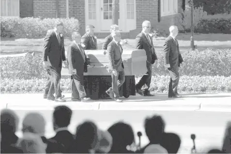  ?? AGENCE FRANCE PRESSE ?? A casket carrying the body of Rev. Billy Graham is carried away from his funeral service at the Billy Graham Library on March 2, 2018 in Charlotte, North Carolina. A spiritual counselor for every president from Harry Truman to Barack Obama and other world leaders for more than 60 years, Graham died February 21 at the age of 99.