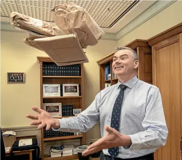  ?? KEVIN STENT/STUFF ?? National Party environmen­t spokesman Scott Simpson with the neatly wrapped parcels of plastic he received in the post yesterday.