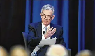  ?? ANNIE RICE / ASSOCIATED PRESS ?? Federal Reserve Chairman Jerome Powell speaks at a conference in Atlanta on Friday. Powell and two predecesso­rs issued a full-throated defense of the institutio­n’s independen­ce.