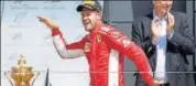  ?? RUTERS ?? Ferrari's Sebastian Vettel celebrates the British GP win.