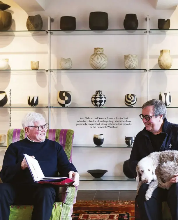  ??  ?? John Oldham and Terence Bacon in front of their extensive collection of studio pottery, which they have generously bequeathed, along with important artworks, to The Hepworth Wakefield.