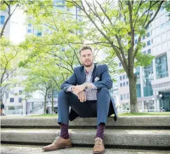  ?? TYLER ANDERSON / NATIONAL POST ?? “I personally take a lot of pride in ownership,” says Patrick Howard, 26, who purchased a two-bedroom condo that he looks forward to putting his own stamp on and plans to be in for the long term.