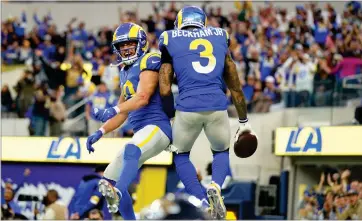  ?? AP PHOTO BY JAE C. HONG ?? Los Angeles Rams wide receiver Odell Beckham Jr. (3) celebrates his touchdown catch with Cooper Kupp during the second half of an NFL football game against the Jacksonvil­le Jaguars Sunday, in Inglewood.