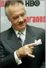  ?? STUART RAMSON — THE ASSOCIATED PRESS FILE ?? Tony Sirico, who plays the role of Paulie “Walnuts” Gualtieri in the hit HBO television series “The Sopranos”, poses for photograph­ers March 7, 2006 in New York.