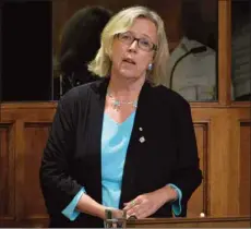  ?? CANADIAN PRESS PHOTO ?? Green party leader Elizabeth May speaks in the House of Commons on October 3 in Ottawa. May says she was “shaken up’’ by the recent Parliament shootings when she sent out a series of tweets defending Jian Ghomeshi.