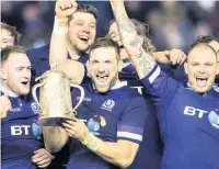  ??  ?? CALCUTTA STRUT Scotland celebrate beating England last year