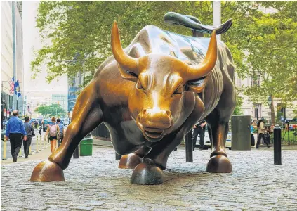  ?? PHOTO: GETTY IMAGES ?? Fired up . . . The bull of Wall St in New York City.