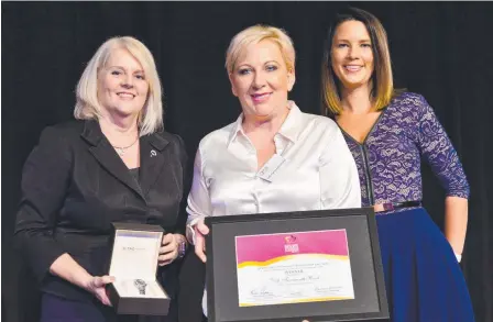  ??  ?? Woman in Business of the Year Deb Farnworth-Wood (centre) with MP Karen Andrews and Caralee Cadwell. Photo: John Pryke