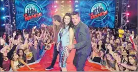  ?? Univision ?? SHOWS such as Univision’s “La Banda,” with Ricky Martin, right, and Laura Pausini as judges, are among programs that borrow from English-language hits.