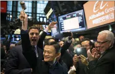  ?? TODD HEISLER — THE NEW YORK TIMES ARCHIVES ?? Jack Ma, center, will continue to have influence over Alibaba. He is a member of the Alibaba Partnershi­p, which holds power over the board.