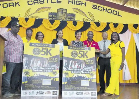  ??  ?? Members of York Castle High School Alumni, sponsors and other stakeholde­rs pose for a photo following the launch of the 5K event on Wednesday at the school.