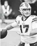  ?? DAVID BECKER/AP ?? Bills’ Josh Allen looks to pass against the Raiders on Sunday in Las Vegas.