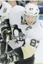  ?? CHRIS O’MEARA/THE ASSOCIATED PRESS ?? Sidney Crosby says Nathan MacKinnon, who also grew up in Cole Harbour, N.S., is adjusting well to the NHL.
