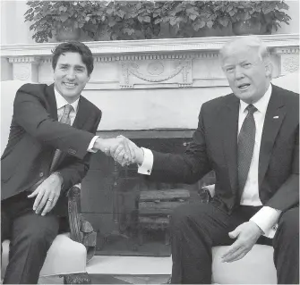  ?? SEAN KILPATRICK, THE CANADIAN PRESS ?? Prime Minister Justin Trudeau shakes hands with U.S. President Donald Trump in the Oval Office of the White House, in Washington, D.C., on Monday. Trump has turned the simple social convention into a highly analyzed and debated spectator sport.